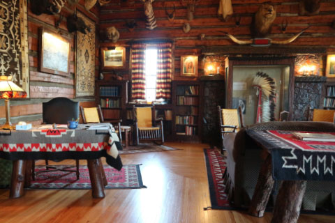 The interior of the rustic lodge at Woolaroc