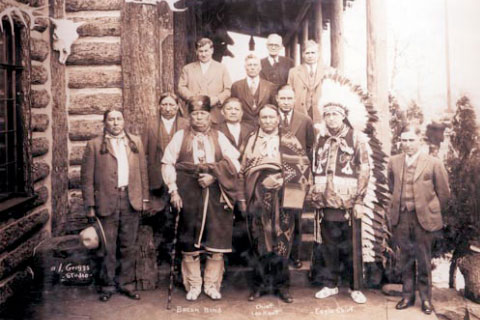 An old photograph of Frank Phillips and his Native American friends